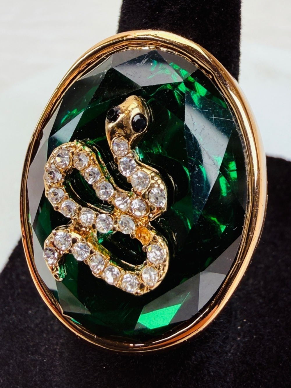 Beautiful, goldtone, emerald green bling snake statement ring